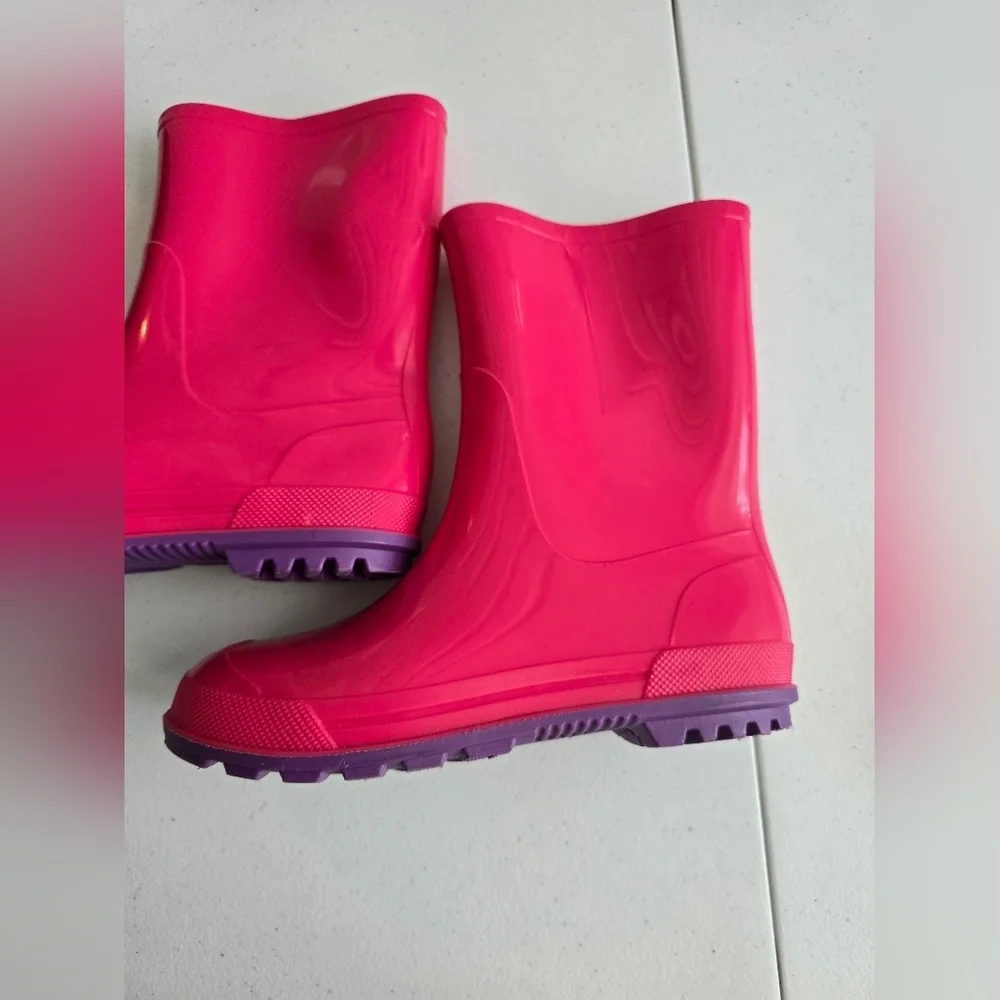 Vibrant Pink Rain Boots with Purple Soles